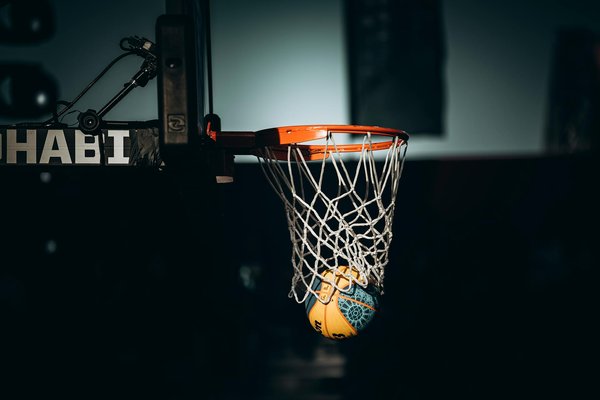 What is the economic impact of niche sports on local communities in the UK?